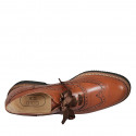 Woman's laced Oxford shoe with wingtip decorations in cognac brown leather heel 3 - Available sizes:  43