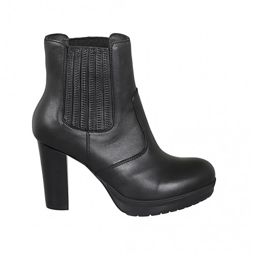 Woman's ankle boot with platform and elastic bands in black leather heel 8 - Available sizes:  42