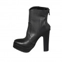 Woman's ankle boot in black leather with backside zipper, platform and heel 12 - Available sizes:  31, 42