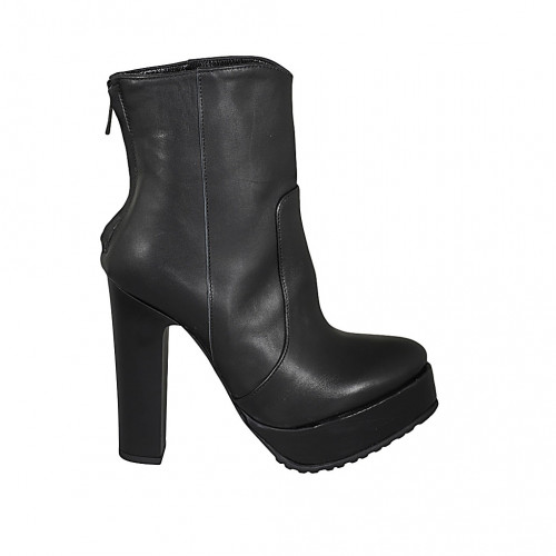 Woman's ankle boot in black leather with backside zipper, platform and heel 12 - Available sizes:  31, 42