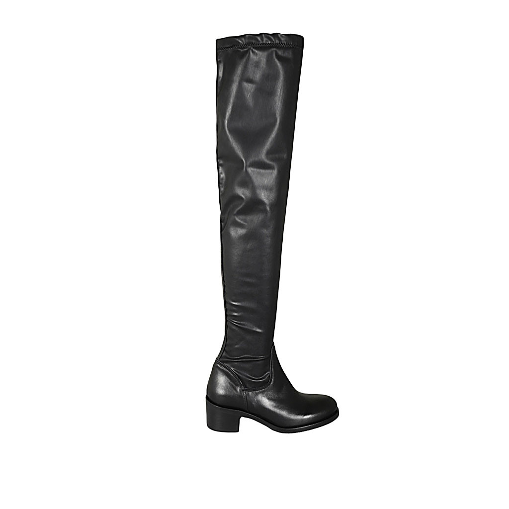 Woman's thighhigh boot in black leather and elastic material heel 5