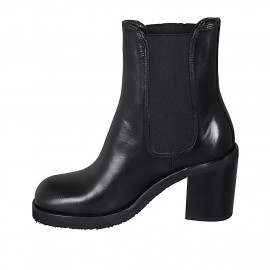 Woman's ankle boot with elastic bands and squared tip in black leather heel 8 - Available sizes:  42 2