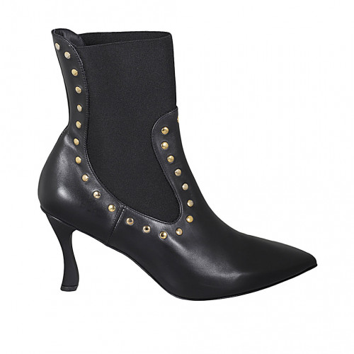 Woman's pointy ankle boot with studs...