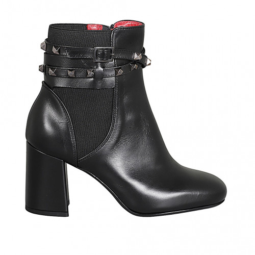 Woman's ankle boot with zipper, strap with studs and elastic band in black leather heel 8 - Available sizes:  32, 42