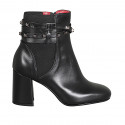 Woman's ankle boot with zipper, strap with studs and elastic band in black leather heel 8 - Available sizes:  32, 33, 42, 45