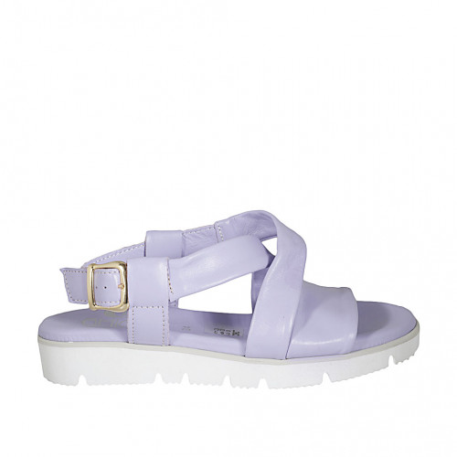 Woman's sandal in lilac leather wedge...