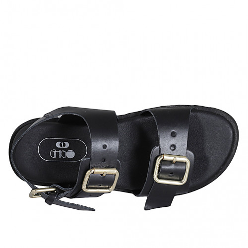 Woman's sandal with adjustable buckles in black leather wedge heel 2