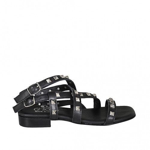 Woman's straps sandal with studs in...