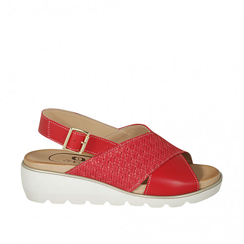 Woman's sandal in red leather and...