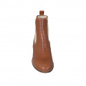 Woman's ankle boot in tan brown pierced leather with elastic bands heel 3 - Available sizes:  32, 33, 34, 42, 43, 44, 45, 46
