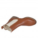 Woman's ankle boot in tan brown pierced leather with elastic bands heel 3 - Available sizes:  32, 33, 34, 42, 43, 44, 45, 46