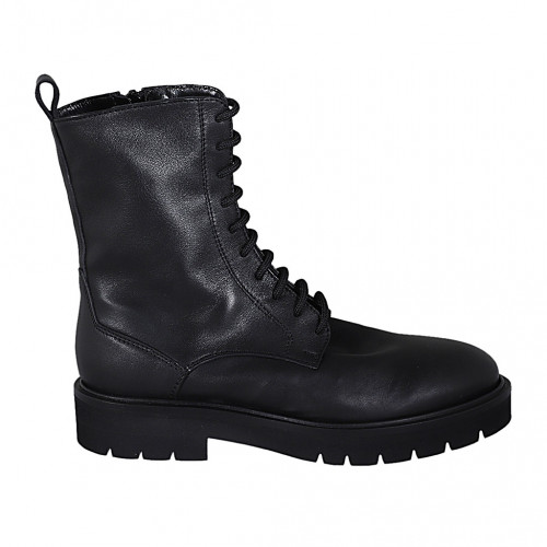 Woman's laced combat style ankle boot...