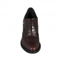 Scarpa Oxford stringata da donna in pelle marrone con decorazione a coda di rondine tacco 7 - Misure disponibili: 32, 43