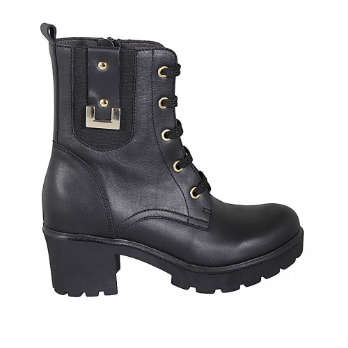 Woman's laced ankle boot with zipper, elastic bands, studs and accessory in black leather heel 6 - Available sizes:  43, 44