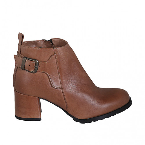 Woman's low ankle boot with buckle...