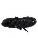 Woman's laced shoe with zipper in black leather and patent leather wedge heel 4 - Available sizes:  44, 45