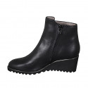 Woman's ankle boot with buckle and zipper in black leather wedge heel 6 - Available sizes:  42, 43