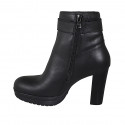 Woman's ankle boot with buckle, zipper and platform in black leather heel 10 - Available sizes:  42, 43