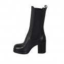 Woman's high ankle boot in black leather with elastic bands and platform heel 9 - Available sizes:  42