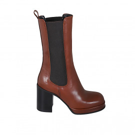 Woman's high ankle boot in cognac brown leather with elastic bands and platform heel 9 - Available sizes:  42, 43