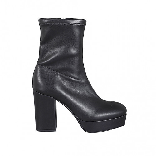 Woman's ankle boot with zipper and platform in black elastic material and leather heel 10 - Available sizes:  44