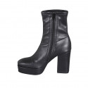 Woman's ankle boot with zipper and platform in black elastic material and leather heel 10 - Available sizes:  44
