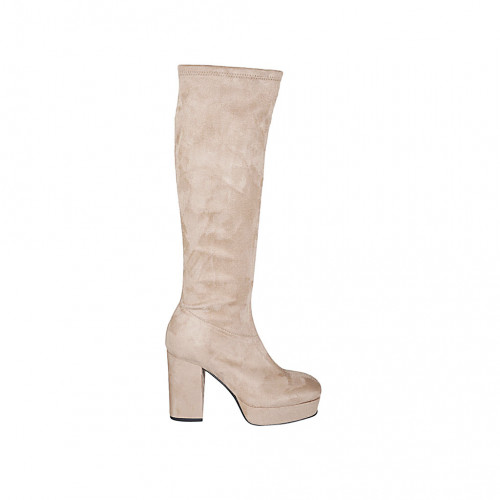 Woman's boot in beige suede and...