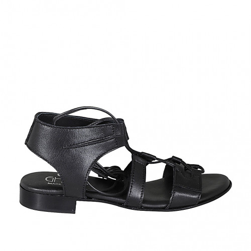 Woman's sandal with laces in black...