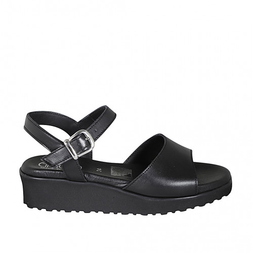 Woman's sandal with strap in black...