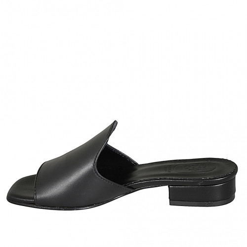 Highfronted mules in black leather...