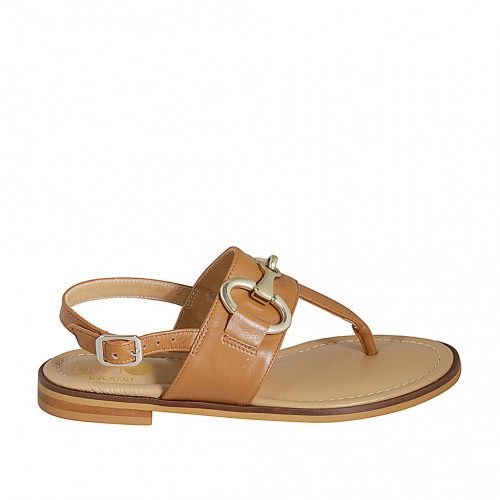 Woman's thong sandal with accessory...