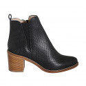 Woman's ankle boot with zipper and elastic band in black pierced leather with heel 7 - Available sizes:  32, 33, 42, 43, 44, 45, 46