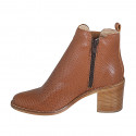 Woman's ankle boot with zipper and elastic band in cognac brown pierced leather heel 7 - Available sizes:  43, 44, 45