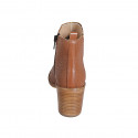 Woman's ankle boot with zipper and elastic band in cognac brown pierced leather heel 7 - Available sizes:  43, 44