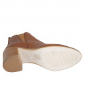 Woman's ankle boot with zipper and elastic band in cognac brown pierced leather heel 7 - Available sizes:  43, 44
