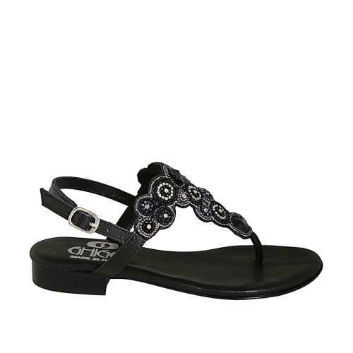 Woman's thong sandal in black leather...