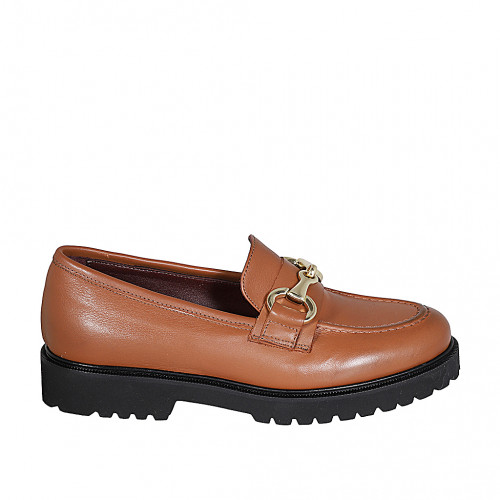 Woman's mocassin with accessory and...