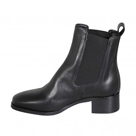 Woman's ankle boot with elastic bands in black leather with heel 4 - Available sizes:  42 2