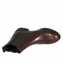 Woman's ankle boot in brown leather with elastic bands and wingtip heel 3 - Available sizes:  32, 45