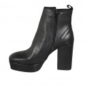 Woman's ankle boot with zipper, platform and stud in black leather heel 10 - Available sizes:  43