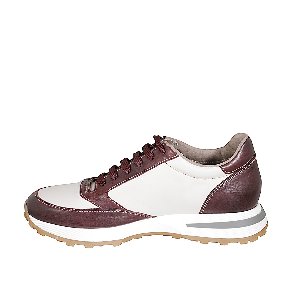 Sneaker stringata da donna con plantare estraibile in pelle avorio e bourdeax zeppa 4 - Misure disponibili: 43, 44, 45, 46 Sneaker stringata da donna con plantare estraibile in pelle avorio e bourdeax zeppa 4 - Misure disponibili: 43, 44, 45, 46