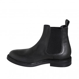 Men's ankle boot with elastic bands in black colored leather - Available sizes:  37, 46, 47, 48, 50, 51, 52, 53, 54 2