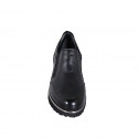 Woman's highfronted shoe with elastic bands in black leather and patent leather wedge heel 4 - Available sizes:  35, 42, 43