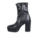 Woman's ankle boot with zipper and platform in black elastic material and leather heel 10 - Available sizes:  33, 34, 35