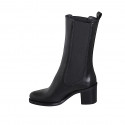 Woman's high ankle boot with rounded tip and elastic bands in black leather heel 6 - Available sizes:  42, 43, 44, 45