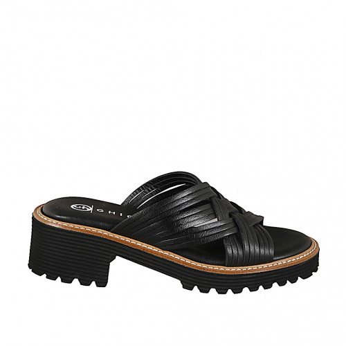 Women's mules with braided straps and...