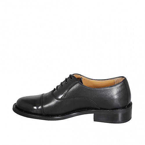 Woman’s Oxford lace-up shoes with a...