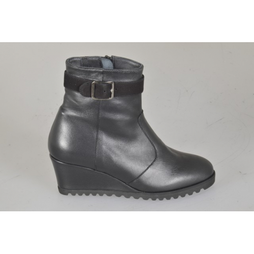 Woman’s black leather ankle boot with...