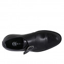 Man’s black leather buckle shoe with a brogue-detailed toe cap - Available sizes:  36, 37, 38, 46, 47, 49, 50, 51, 52