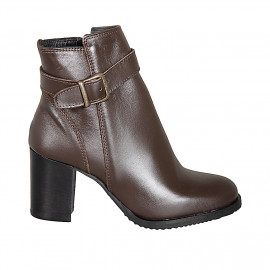 Woman’s dark brown leather...